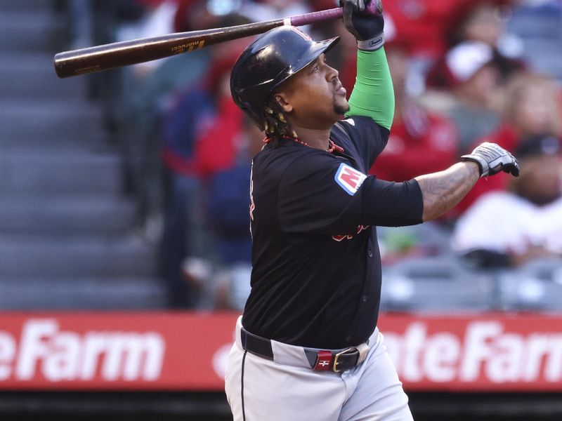 May 24, 2024; Anaheim, California, USA; Cleveland Guardians third base José Ramírez (11) watches his home run against the Los Angeles Angels during the third inning of a game at Angel Stadium. Mandatory Credit: Jessica Alcheh-USA TODAY Sports