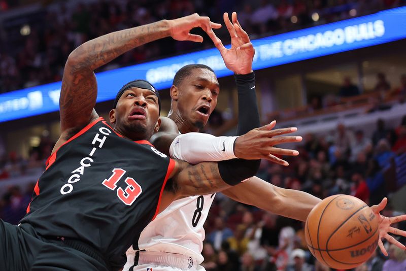 CHICAGO, ILLINOIS - NOVEMBER 03: Torrey Craig #13 of the Chicago Bulls and Lonnie Walker IV #8 of the Brooklyn Nets battle for a rebound in the first half of the NBA In-Season Tournament at the United Center on November 03, 2023 in Chicago, Illinois. NOTE TO USER: User expressly acknowledges and agrees that, by downloading and or using this photograph, User is consenting to the terms and conditions of the Getty Images License Agreement. (Photo by Michael Reaves/Getty Images)