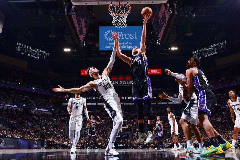 SAN ANTONIO, TX - NOVEMBER 11: Domantas Sabonis #11 of the Sacramento Kings shoots the ball during the game against the San Antonio Spurs on November 11, 2024 at the Frost Bank Center in San Antonio, Texas. NOTE TO USER: User expressly acknowledges and agrees that, by downloading and or using this photograph, user is consenting to the terms and conditions of the Getty Images License Agreement. Mandatory Copyright Notice: Copyright 2024 NBAE (Photos by Garrett Ellwood/NBAE via Getty Images)