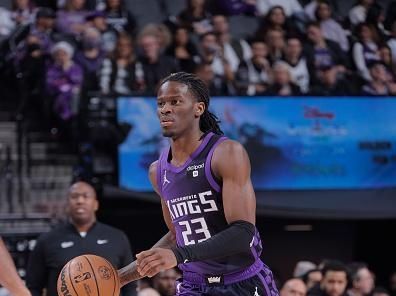 SACRAMENTO, CA - DECEMBER 16: Keon Ellis #23 of the Sacramento Kings dribbles the ball during the game against the Utah Jazz on December 16, 2023 at Golden 1 Center in Sacramento, California. NOTE TO USER: User expressly acknowledges and agrees that, by downloading and or using this Photograph, user is consenting to the terms and conditions of the Getty Images License Agreement. Mandatory Copyright Notice: Copyright 2023 NBAE (Photo by Rocky Widner/NBAE via Getty Images)