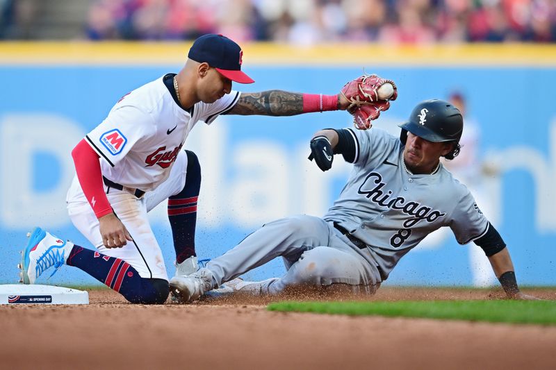 Apr 8, 2024; Cleveland, Ohio, USA; Cleveland Guardians shortstop Brayan Rocchio (4) forces out Chicago White Sox second baseman Nicky Lopez (8) during the seventh inning at Progressive Field. Mandatory Credit: David Dermer-USA TODAY Sports