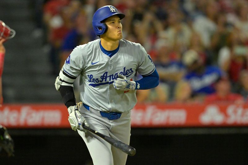 Sep 4, 2024; Anaheim, California, USA; Los Angeles Dodgers designated hitter Shohei Ohtani (17) flies out in the seventh inning against the Los Angeles Angels at Angel Stadium. Mandatory Credit: Jayne Kamin-Oncea-Imagn Images