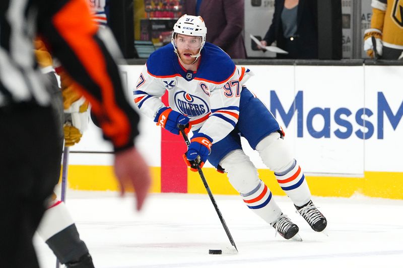 May 14, 2025; Las Vegas, Nevada, USA; Edmonton Oilers center Connor McDavid (97) skates against the Vegas Golden Knights during the first period of game five of the second round of the 2025 Stanley Cup Playoffs at T-Mobile Arena. Mandatory Credit: Stephen R. Sylvanie-Imagn Images