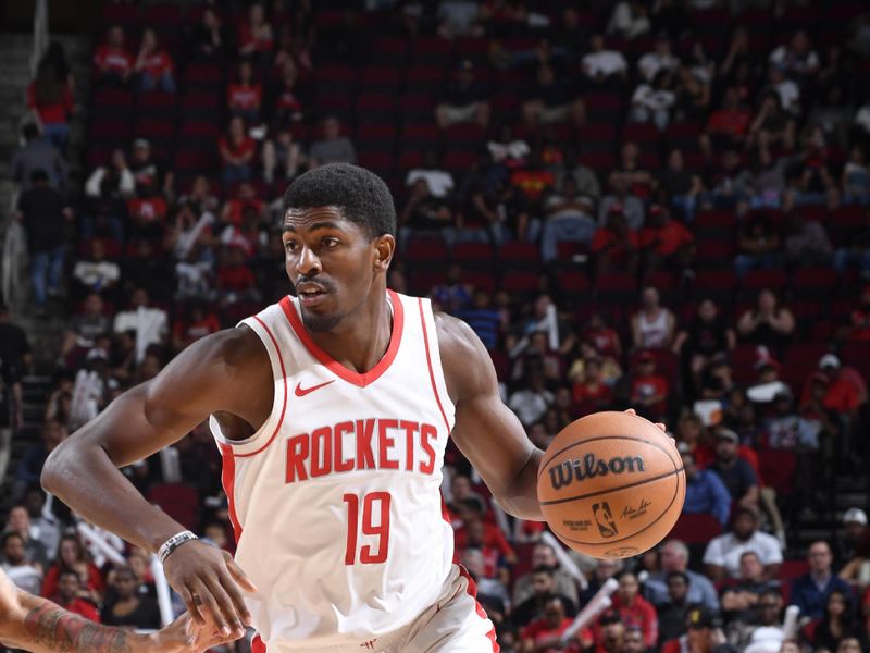 HOUSTON, TX - OCTOBER 15: Nate Williams #19 of the Houston Rockets drives to the basket during the game against the New Orleans Pelicans during a NBA preseason game on October 15, 2024 at the Toyota Center in Houston, Texas. NOTE TO USER: User expressly acknowledges and agrees that, by downloading and or using this photograph, User is consenting to the terms and conditions of the Getty Images License Agreement. Mandatory Copyright Notice: Copyright 2024 NBAE (Photo by Logan Riely/NBAE via Getty Images)