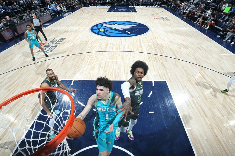 MINNEAPOLIS, MN -  JANUARY 22: LaMelo Ball #1 of the Charlotte Hornets shoots the ball during the game against the Minnesota Timberwolves on January 22, 2024 at Target Center in Minneapolis, Minnesota. NOTE TO USER: User expressly acknowledges and agrees that, by downloading and or using this Photograph, user is consenting to the terms and conditions of the Getty Images License Agreement. Mandatory Copyright Notice: Copyright 2024 NBAE (Photo by David Sherman/NBAE via Getty Images)