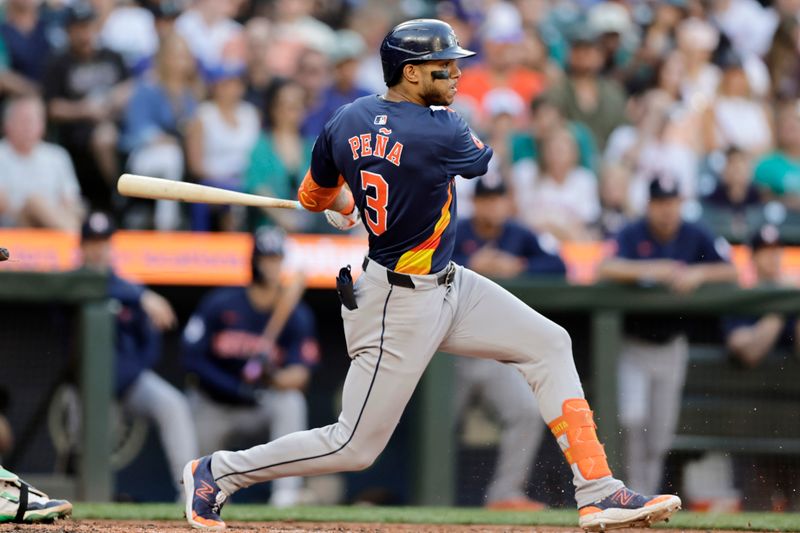 Jul 20, 2024; Seattle, Washington, USA; Houston Astros shortstop Jeremy Pena (3) hits an RBI single against the Seattle Mariners during the fourth inning at T-Mobile Park. Mandatory Credit: John Froschauer-USA TODAY Sports