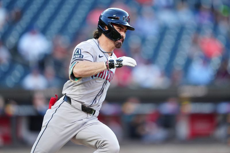 May 31, 2024; New York City, New York, USA; Arizona Diamondbacks center fielder Corbin Carroll (7) runs out a single against the New York Mets during the first inning at Citi Field. Mandatory Credit: Gregory Fisher-USA TODAY Sports