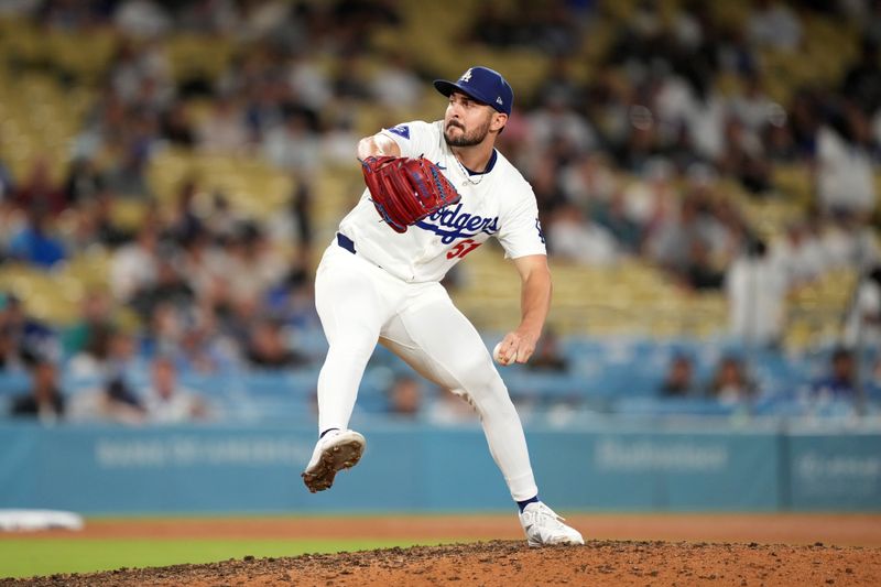 Aug 21, 2024; Los Angeles, California, USA; Los Angeles Dodgers relief pitcher Alex Vesia (51) throws in the ninth inning against the Seattle Mariners at Dodger Stadium. Mandatory Credit: Kirby Lee-USA TODAY Sports