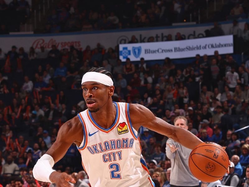 OKLAHOMA CITY, OK - FEBRUARY 23: Shai Gilgeous-Alexander #2 of the Oklahoma City Thunder handles the ball during the game against the Washington Wizards on February 23, 2024 at Paycom Arena in Oklahoma City, Oklahoma. NOTE TO USER: User expressly acknowledges and agrees that, by downloading and or using this photograph, User is consenting to the terms and conditions of the Getty Images License Agreement. Mandatory Copyright Notice: Copyright 2024 NBAE (Photo by Zach Beeker/NBAE via Getty Images)