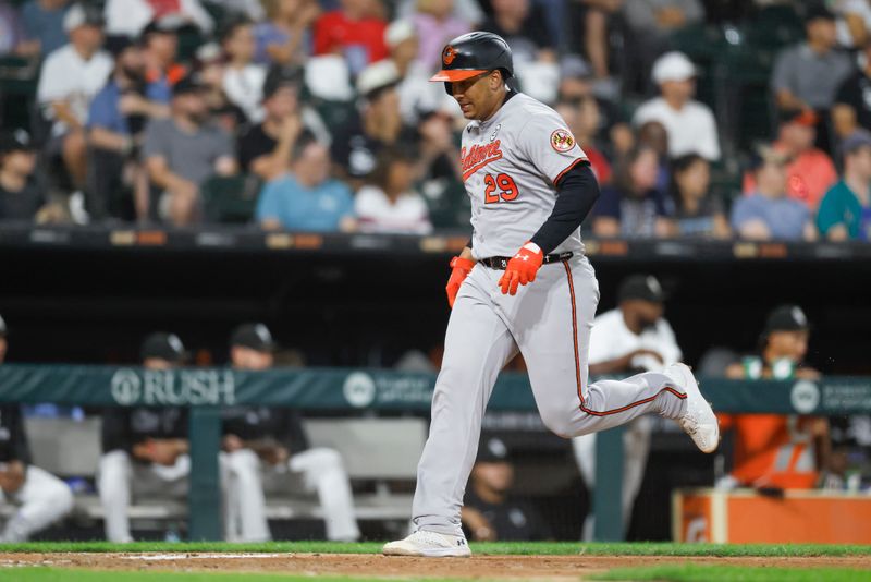 Sep 15, 2025; Chicago, Illinois, USA; Baltimore Orioles catcher Samuel Basallo (29) scores against the Chicago White Sox during the third inning at Rate Field. Mandatory Credit: Kamil Krzaczynski-Imagn Images