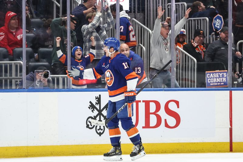 Oct 29, 2024; Elmont, New York, USA;  New York Islanders center Mathew Barzal (13) celebrates after scoring a goal in the third period against the Anaheim Ducks at UBS Arena. Mandatory Credit: Wendell Cruz-Imagn Images