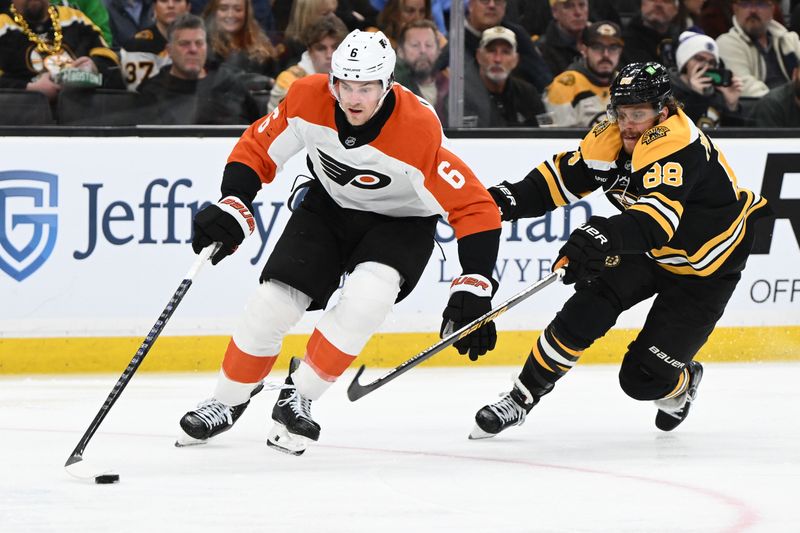 Oct 29, 2024; Boston, Massachusetts, USA; Philadelphia Flyers defenseman Travis Sanheim (6) skates against Boston Bruins right wing David Pastrnak (88) during the third period at TD Garden. Mandatory Credit: Brian Fluharty-Imagn Images