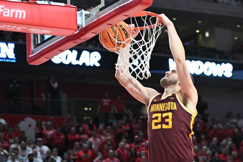 Mar 1, 2025; Lincoln, Nebraska, USA; Minnesota Golden Gophers forward Parker Fox (23) dunks against the Nebraska Cornhuskers during the second half at Pinnacle Bank Arena. Mandatory Credit: Steven Branscombe-Imagn Images