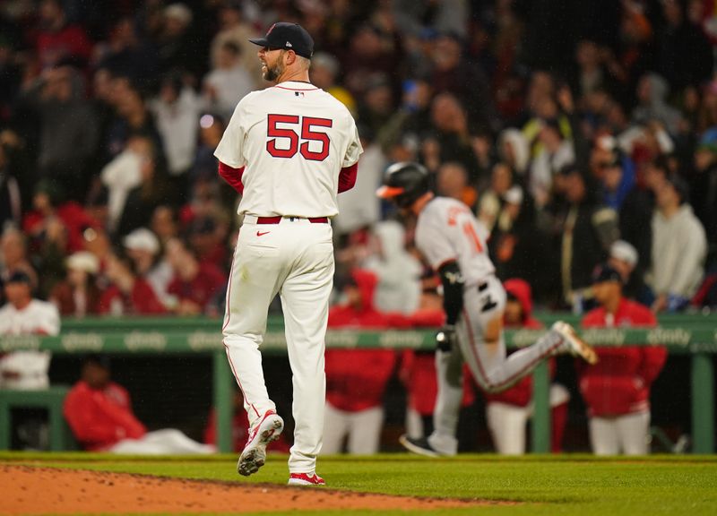 Apr 10, 2024; Boston, Massachusetts, USA; Boston Red Sox pitcher Chris Martin (55) looks on as Baltimore Orioles third baseman Jordan Westburg (11) rounds the base after hitting a three run home run in the seventh inning at Fenway Park. Mandatory Credit: David Butler II-USA TODAY Sports