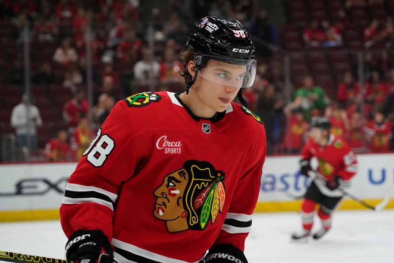 Oct 4, 2024; Chicago, Illinois, USA; Chicago Blackhawks center Connor Bedard (98) during warmups before a game against the Minnesota Wild at United Center. Mandatory Credit: David Banks-Imagn Images