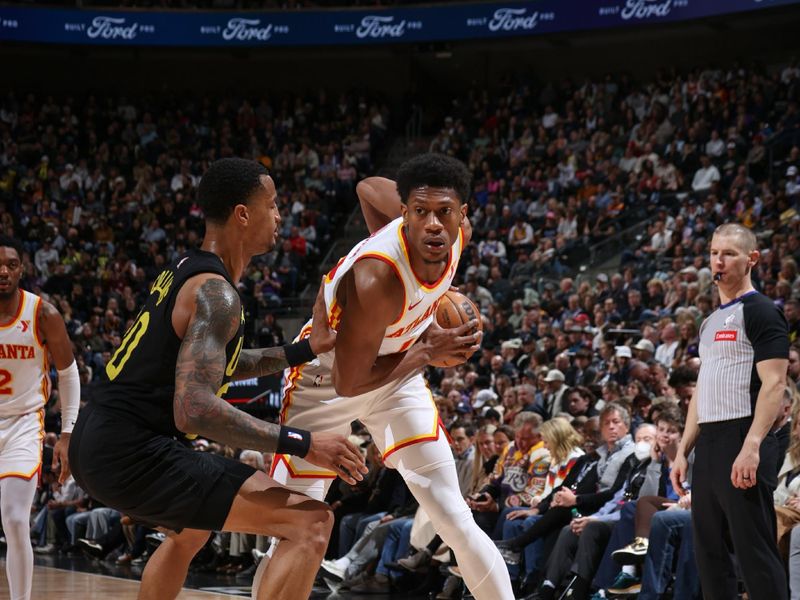 SALT LAKE CITY, UT - MARCH 15: De'Andre Hunter #12 of the Atlanta Hawks handles the ball during the game  on March 15, 2024 at Delta Center in Salt Lake City, Utah. NOTE TO USER: User expressly acknowledges and agrees that, by downloading and or using this Photograph, User is consenting to the terms and conditions of the Getty Images License Agreement. Mandatory Copyright Notice: Copyright 2024 NBAE (Photo by Melissa Majchrzak/NBAE via Getty Images)