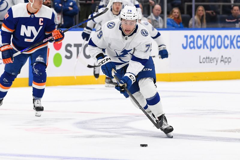 Apr 6, 2023; Elmont, New York, USA; Tampa Bay Lightning center Ross Colton (79) skates across the blue against the New York Islanders during the first period at UBS Arena. Mandatory Credit: Dennis Schneidler-USA TODAY Sports