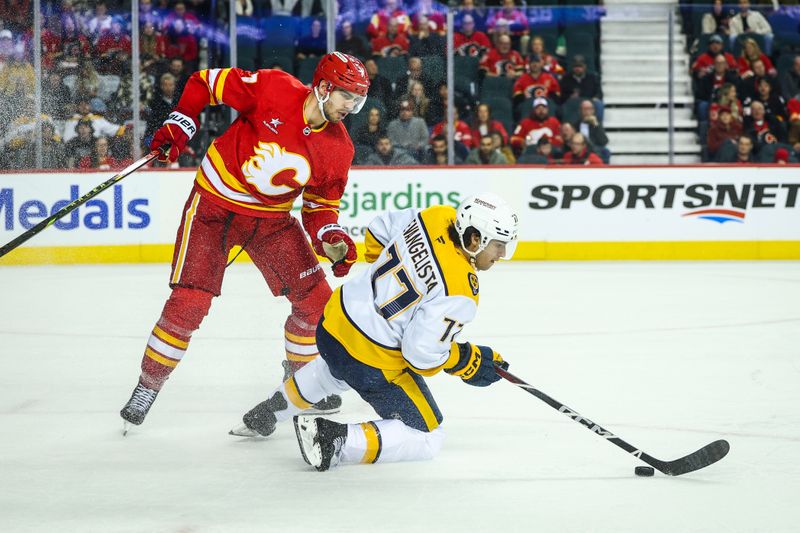 Nov 15, 2024; Calgary, Alberta, CAN; Nashville Predators right wing Luke Evangelista (77) and Calgary Flames defenseman Kevin Bahl (7) battles for the puck during the third period at Scotiabank Saddledome. Mandatory Credit: Sergei Belski-Imagn Images