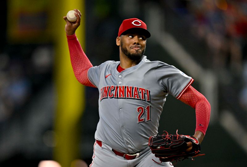 Apr 27, 2024; Arlington, Texas, USA; Cincinnati Reds starting pitcher Hunter Greene (21) pitches against the Texas Rangers during the fifth inning at Globe Life Field. Mandatory Credit: Jerome Miron-USA TODAY Sports