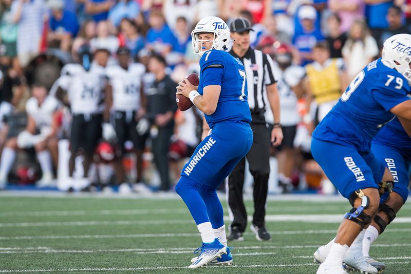 Oct 1, 2022; Tulsa, Oklahoma, USA;  Tulsa Golden Hurricane quarterback Davis Brin (7) drops back to pass during the first quarter against the Cincinnati Bearcats at Skelly Field at H.A. Chapman Stadium. Cincinnati won 31-21. Mandatory Credit: Brett Rojo-USA TODAY Sports