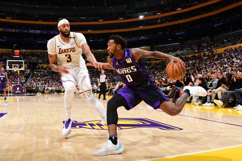 LOS ANGELES, CA - OCTOBER 26: Malik Monk #0 of the Sacramento Kings drives to the basket during the game against the Los Angeles Lakers on October 26, 2024 at Crypto.Com Arena in Los Angeles, California. NOTE TO USER: User expressly acknowledges and agrees that, by downloading and/or using this Photograph, user is consenting to the terms and conditions of the Getty Images License Agreement. Mandatory Copyright Notice: Copyright 2024 NBAE (Photo by Adam Pantozzi/NBAE via Getty Images)