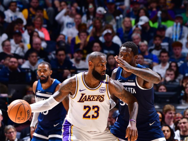 MINNEAPOLIS, MN -  APRIL 27:  LeBron James #23 of the Los Angeles Lakers handles the ball during the game against the Minnesota Timberwolves during Round 1 Game 4 of the 2025 NBA Playoffs on April 27, 2025 at Target Center in Minneapolis, Minnesota. NOTE TO USER: User expressly acknowledges and agrees that, by downloading and or using this Photograph, user is consenting to the terms and conditions of the Getty Images License Agreement. Mandatory Copyright Notice: Copyright 2025 NBAE (Photo by Barry Gossage/NBAE via Getty Images)