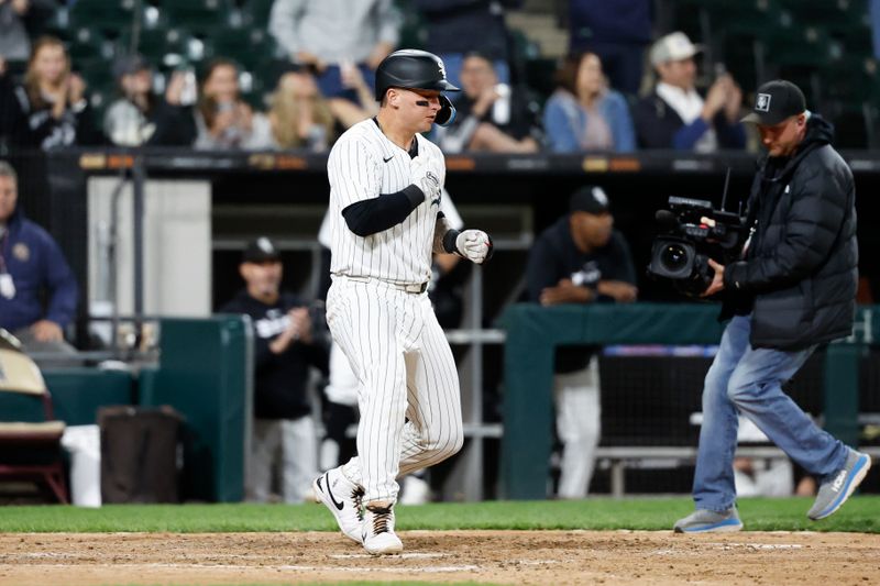 May 27, 2024; Chicago, Illinois, USA; Chicago White Sox catcher Korey Lee (26) crosses home plate after hitting a solo home run against the Toronto Blue Jays during the ninth inning at Guaranteed Rate Field. Mandatory Credit: Kamil Krzaczynski-USA TODAY Sports