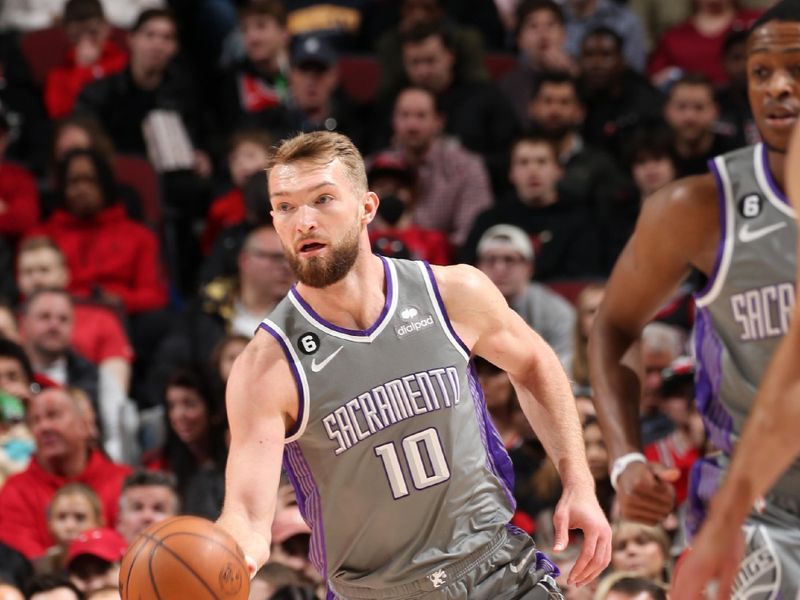 CHICAGO, IL - MARCH 15: Domantas Sabonis #10 of the Sacramento Kings dribbles the ball during the game against the Chicago Bulls on March 15, 2023 at United Center in Chicago, Illinois. NOTE TO USER: User expressly acknowledges and agrees that, by downloading and or using this photograph, User is consenting to the terms and conditions of the Getty Images License Agreement. Mandatory Copyright Notice: Copyright 2023 NBAE (Photo by Gary Dineen/NBAE via Getty Images)