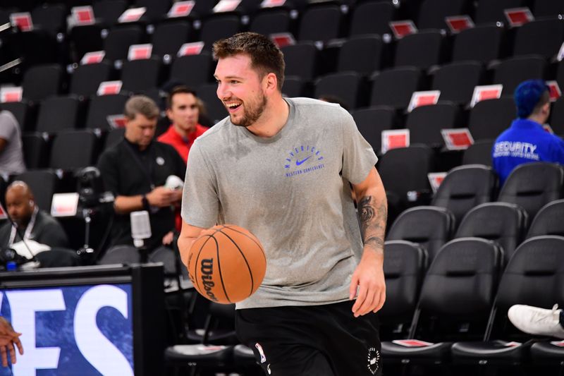 INGLEWOOD, CA - OCTOBER 14: Luka Doncic #77 of the Dallas Mavericks smiles before the game against the LA Clippers during a NBA Preseason game on October 14, 2024 at the Intuit Dome in Inglewood, California. NOTE TO USER: User expressly acknowledges and agrees that, by downloading and/or using this Photograph, user is consenting to the terms and conditions of the Getty Images License Agreement. Mandatory Copyright Notice: Copyright 2024 NBAE (Photo by Adam Pantozzi/NBAE via Getty Images)