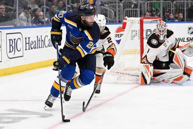 Mar 17, 2024; St. Louis, Missouri, USA; St. Louis Blues left wing Brandon Saad (20) controls the puck against the Anaheim Ducks during the second period at Enterprise Center. Mandatory Credit: Jeff Le-USA TODAY Sports