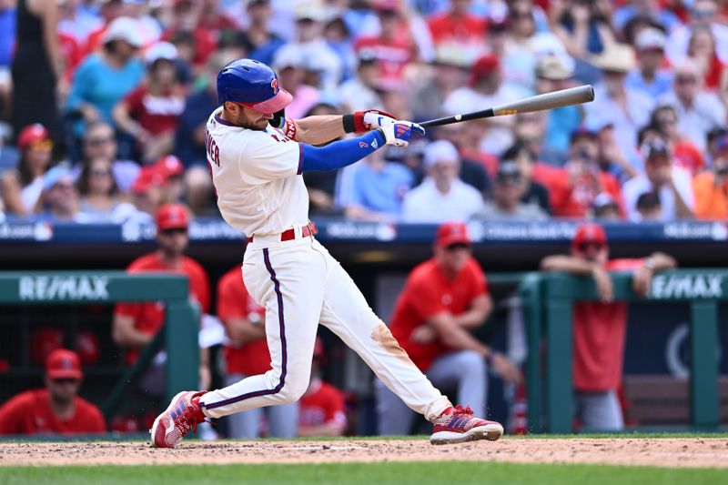 Aug 30, 2023; Philadelphia, Pennsylvania, USA; Philadelphia Phillies shortstop Trea Turner (7) hits a three-run home run against the Los Angeles Angels in the sixth inning at Citizens Bank Park. Mandatory Credit: Kyle Ross-USA TODAY Sports