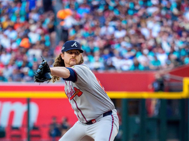 Apr 26, 2025; Phoenix, Arizona, USA;  Atlanta Braves pitcher Grant Holmes (66) on the mound to pitch in the second inning against the Arizona Diamondbacks at Chase Field. Mandatory Credit: Allan Henry-Imagn Images