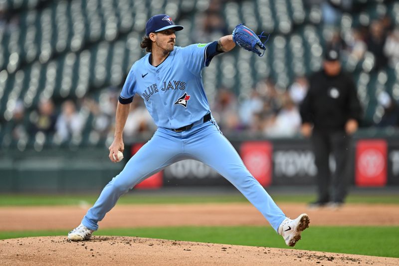 May 28, 2024; Chicago, Illinois, USA;  Toronto Blue Jays pitcher Kevin Gausman (34) pitches in the first inning against the Chicago White Sox at Guaranteed Rate Field. Mandatory Credit: Jamie Sabau-USA TODAY Sports