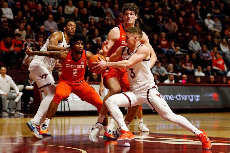 Jan 10, 2024; Blacksburg, Virginia, USA; Virginia Tech Hokies guard Sean Pedulla (3) drives to the basket against Clemson Tigers guard Dillon Hunter (2) during the second half at Cassell Coliseum. Mandatory Credit: Peter Casey-USA TODAY Sports