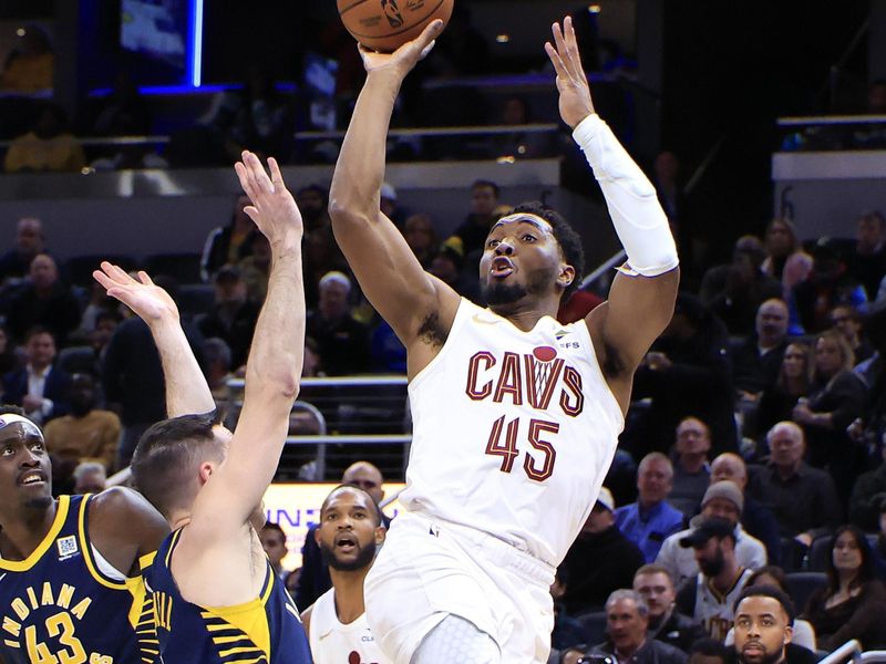 INDIANAPOLIS, INDIANA - JANUARY 14:  Donovan Mitchell #45 of the Cleveland Cavaliers takes a shot over T.J. McConnell #9 of the Indiana Pacers during the second half at Gainbridge Fieldhouse on January 14, 2025 in Indianapolis, Indiana. NOTE TO USER: User expressly acknowledges and agrees that, by downloading and or using this photograph, User is consenting to the terms and conditions of the Getty Images License Agreement. (Photo by Justin Casterline/Getty Images)