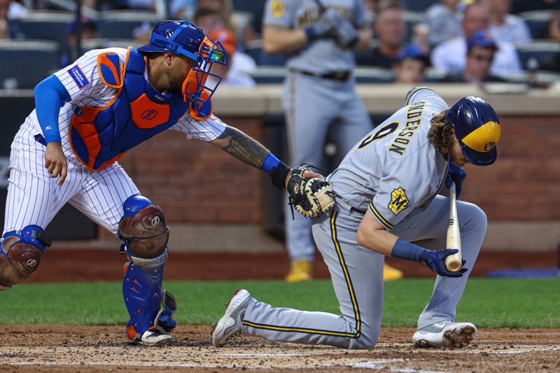 Jun 27, 2023; New York City, New York, USA; New York Mets catcher Omar Narvaez (2) tags out Milwaukee Brewers third baseman Brian Anderson (9) after a strike out during the fourth inning at Citi Field. Mandatory Credit: Vincent Carchietta-USA TODAY Sports