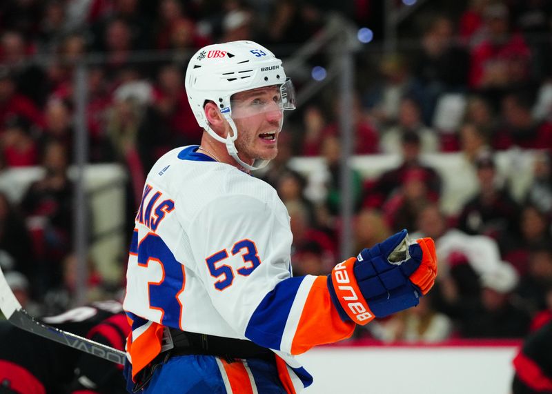 Apr 22, 2024; Raleigh, North Carolina, USA; New York Islanders center Casey Cizikas (53) reacts against the Carolina Hurricanes during the first period in game two of the first round of the 2024 Stanley Cup Playoffs at PNC Arena. Mandatory Credit: James Guillory-USA TODAY Sports