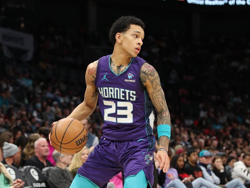 CHARLOTTE, NC - FEBRUARY 14: Kai Jones #23 of the Charlotte Hornets handles the ball during the game against the Atlanta Hawks on February 14, 2024 at Spectrum Center in Charlotte, North Carolina. NOTE TO USER: User expressly acknowledges and agrees that, by downloading and or using this photograph, User is consenting to the terms and conditions of the Getty Images License Agreement.  Mandatory Copyright Notice:  Copyright 2024 NBAE (Photo by Brock Williams-Smith/NBAE via Getty Images)