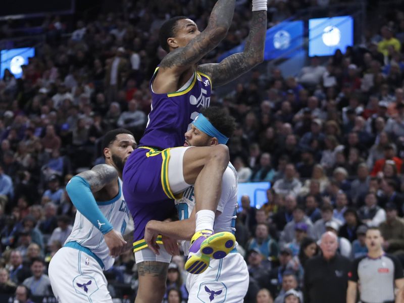 SALT LAKE CITY, UT - FEBRUARY 22: John Collins #20 of the Utah Jazz jumps into Seth Curry #30 of the Charlotte Hornets during the first half of their game at the Delta Center on February 22, 2024 in Salt Lake City, Utah.  NOTE TO USER: User expressly acknowledges and agrees that, by downloading and or using this Photograph, User is concenting to the terms and conditions of the Getty Images license Agreement. (Photo by Chris Gardner/Getty Images)