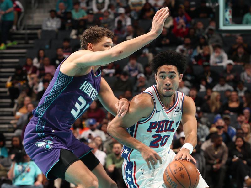 CHARLOTTE, NC - DECEMBER 3: Jared McCain #20 of the Philadelphia 76ers drives to the basket during the game against the Charlotte Hornets during an NBA Emirates Cup game on December 3, 2024 at Spectrum Center in Charlotte, North Carolina. NOTE TO USER: User expressly acknowledges and agrees that, by downloading and or using this photograph, User is consenting to the terms and conditions of the Getty Images License Agreement. Mandatory Copyright Notice: Copyright 2024 NBAE (Photo by Kent Smith/NBAE via Getty Images)