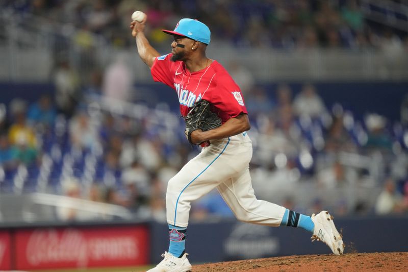 Aug 24, 2024; Miami, Florida, USA;  Miami Marlins shortstop Vidal Bruján (17) pitches in the ninth inning against the Chicago Cubs at loanDepot Park. Mandatory Credit: Jim Rassol-USA TODAY Sports