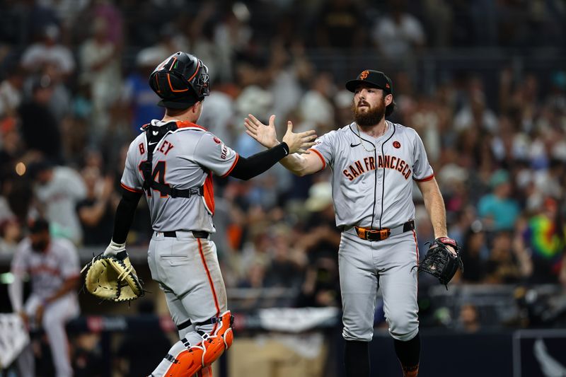 Sep 7, 2024; San Diego, California, USA; San Francisco Giants relief pitcher Ryan Walker (74) high fives catcher Patrick Bailey (14) after recording a save against the San Diego Padres at Petco Park. Mandatory Credit: Chadd Cady-Imagn Images