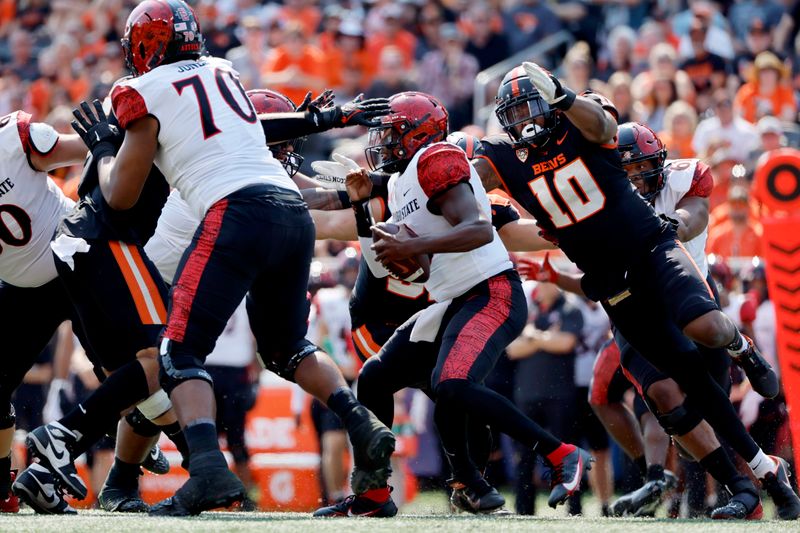 Sep 16, 2023; Corvallis, Oregon, USA; Oregon State Beavers linebacker Andrew Chatfield Jr. (10) sacks San Diego State Aztecs quarterback Jalen Mayden (18)  during the first half at Reser Stadium. Mandatory Credit: Soobum Im-USA TODAY Sports