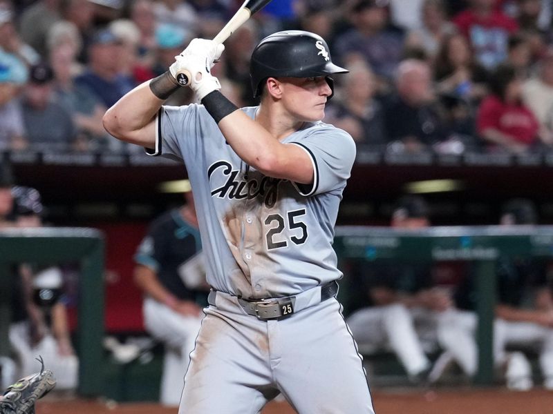 Jun 15, 2024; Phoenix, Arizona, USA; Chicago White Sox first base Andrew Vaughn (25) bats against the Arizona Diamondbacks during the sixth inning at Chase Field. Mandatory Credit: Joe Camporeale-USA TODAY Sports