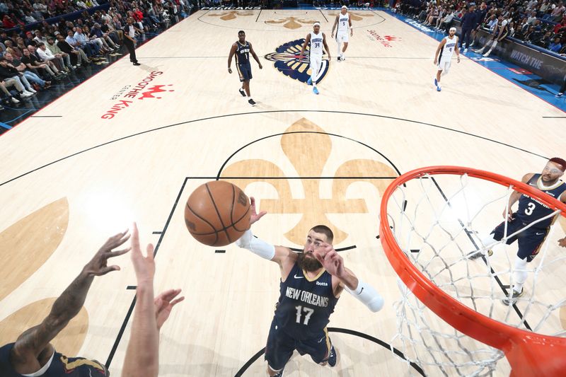 NEW ORLEANS, LA - APRIL 3:  Jonas Valanciunas #17 of the New Orleans Pelicans looks for a rebound during the game against the Orlando Magic on April 3, 2024 at the Smoothie King Center in New Orleans, Louisiana. NOTE TO USER: User expressly acknowledges and agrees that, by downloading and or using this Photograph, user is consenting to the terms and conditions of the Getty Images License Agreement. Mandatory Copyright Notice: Copyright 2024 NBAE (Photo by Layne Murdoch Jr./NBAE via Getty Images)