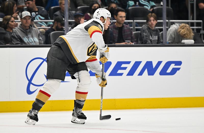 Oct 15, 2022; Seattle, Washington, USA; Vegas Golden Knights defenseman Brayden McNabb (3) looks to pass the puck against the Seattle Kraken at Climate Pledge Arena. Vegas defeated defeated Seattle 5-2. Mandatory Credit: Steven Bisig-USA TODAY Sports