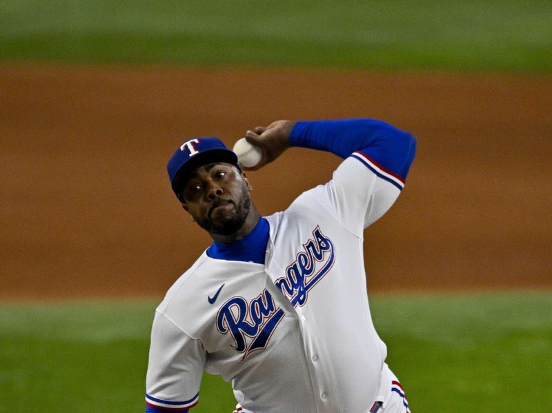 Aug 3, 2023; Arlington, Texas, USA; Texas Rangers relief pitcher Aroldis Chapman (45) pitches against the Chicago White Sox during the eighth inning at Globe Life Field. Mandatory Credit: Jerome Miron-USA TODAY Sports