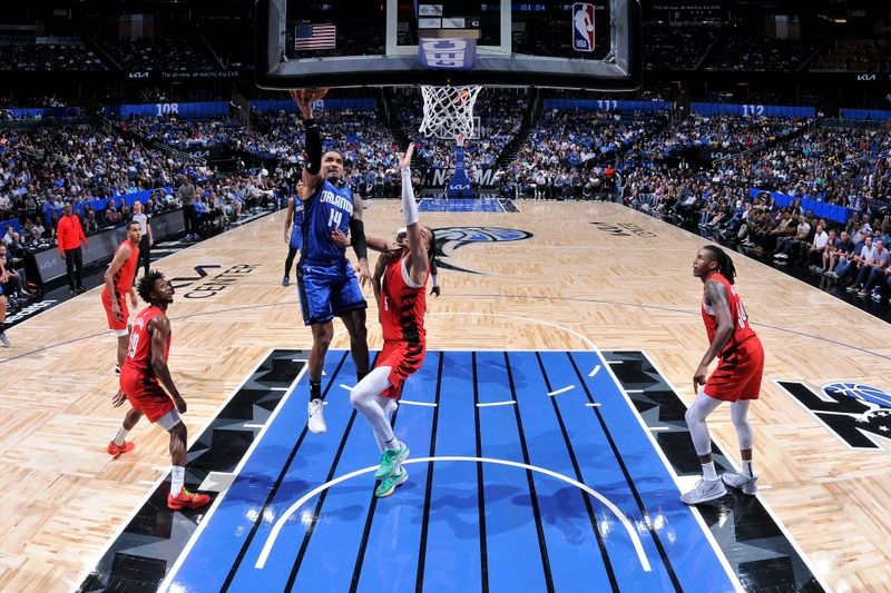 ORLANDO, FL - APRIL 1: Gary Harris #14 of the Orlando Magic drives to the basket during the game against the Portland Trail Blazers on April 1, 2024 at Kia Center in Orlando, Florida. NOTE TO USER: User expressly acknowledges and agrees that, by downloading and or using this photograph, User is consenting to the terms and conditions of the Getty Images License Agreement. Mandatory Copyright Notice: Copyright 2024 NBAE (Photo by Fernando Medina/NBAE via Getty Images)