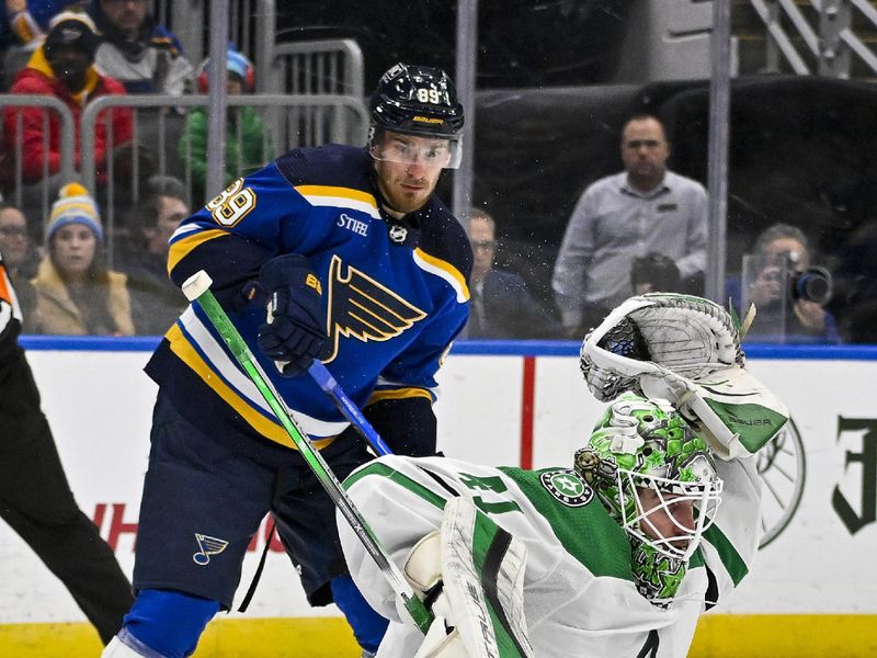 Dec 27, 2023; St. Louis, Missouri, USA;  Dallas Stars goaltender Scott Wedgewood (41) makes a glove save against the St. Louis Blues during the second period at Enterprise Center. Mandatory Credit: Jeff Curry-USA TODAY Sports