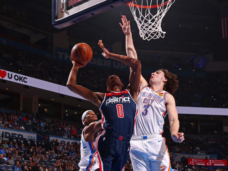 OKLAHOMA CITY, OK - FEBRUARY 23: Bilal Coulibaly #0 of the Washington Wizards drives to the basket during the game against the Oklahoma City Thunder on February 23, 2024 at Paycom Arena in Oklahoma City, Oklahoma. NOTE TO USER: User expressly acknowledges and agrees that, by downloading and or using this photograph, User is consenting to the terms and conditions of the Getty Images License Agreement. Mandatory Copyright Notice: Copyright 2024 NBAE (Photo by Zach Beeker/NBAE via Getty Images)